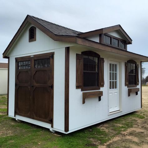 WOODTEX ~ 10x16 Country Cottage ~ It has Barn White walls with Chestnut Brown Urethane stain on the trim and weathered wood shingles. Brown Shed Ideas, White House Brown Trim, Weathered Wood Shingles, Shed Homes Ideas, Stained Wood Trim, Shed Design Plans, Farmhouse Style Exterior, Shed Designs, Pool Shed