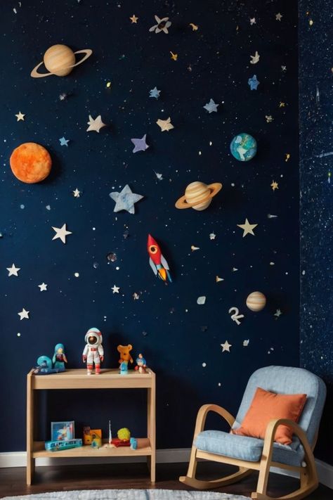 Space-themed kids' playroom with dark blue walls, glow-in-the-dark stars and planets, a rocket-shaped bookshelf, and astronaut toys. Space Toddler Room, Outer Space Classroom Theme, Space Baby Room, Outer Space Aesthetic, Space Theme Nursery, Outer Space Room, Space Classroom, Space Themed Room, Dark Stars