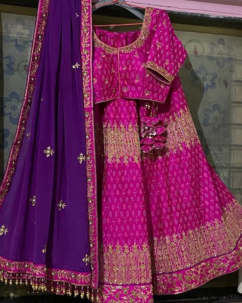 This is a pink lehenga with a purple dupatta to contrast it. Both have gold handwork designs. This vibrant coloured lehenga is perfect for an evening event/wedding/sangeet. Magenta Lehenga Color Combos, Contrast With Pink Colour Suit, Contrast Colour For Pink, Pink Lehenga Color Combos, Dupatta Designs Ideas Color Combinations, Lehenga Colour Combination, Colour Combinations Lehenga, Lehnga Designs Color Combinations, Combination With Purple Lehnga