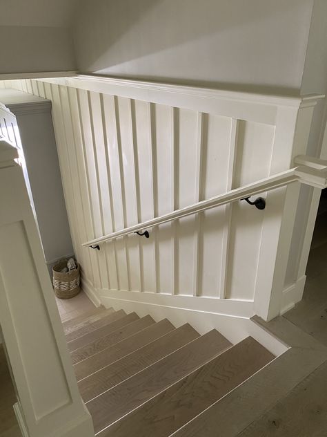 Beadboard On Stairs, Black Board And Batten Staircase, Stairwell Wainscoting Ideas, Small Stairwell Decor, Wayne’s Coating Stairwell, Stairwell Molding Ideas, Enclosed Staircase Makeover, Closed Stairwell Ideas, Basement Landing Ideas