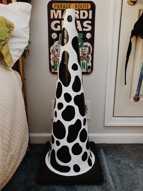 // Cow print painted traffic cone #Cone #cowprint #diy #TrafficConePainting #painting Painted Traffic Cones Ideas Cute, Painted Road Cones, Traffic Come Paintings, Traffic Cone Decor, Decorating Traffic Cones, Painting Cones Ideas, Traffic Come Paintings Ideas, Paint Traffic Cone, Street Cone Painting