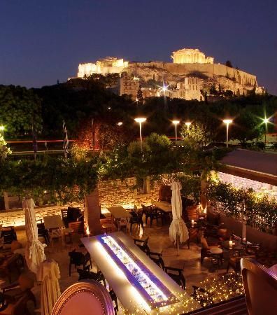 | Dionysos Zonar's Restaurant Reviews, Athens, Greece -  Great place to enjoy the evening air and count the cats roaming around. Athens By Night, Acropolis, Athens Greece, Greece Travel, Beautiful Places To Visit, Athens, Great Places, Places To See, At Night