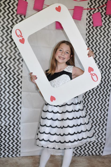 Made a giant playing card frame from foam poster board for a photo booth prop. A cookie sheet is a great pattern to cut out the inside. Giant Playing Cards Decoration, Casino Photo Booth Props, Deck Of Cards Birthday Theme, Queen Of Hearts Photo Booth Mask, Playing Cards Birthday Theme, Casino Party Invitations, Casino Party Foods, Casino Decorations, Casino Birthday