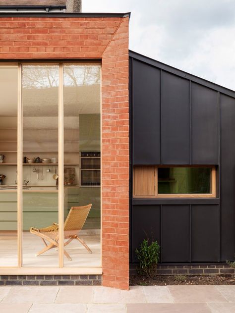 Architect Laura Dewe Mathews has added a staggered red brick extension to a house in West London with spaces for birdwatching, painting and gardening. Red Brick And Natural Wood Exterior, Extension Exterior, Brick Extension, Red Brick House Exterior, Modern Brick House, Hidden House, House Cladding, Edwardian House, House Extension Design