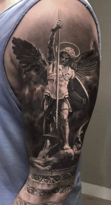 Angel Tattoos - Beautiful Ideas & Designs for Men & Women Gabriel Tattoo, Upper Arm Tattoos For Guys, Angel Sleeve Tattoo, Archangel Michael Tattoo, St Michael Tattoo, Biblical Tattoos, Archangel Tattoo, Christian Sleeve Tattoo, Patriotic Tattoos