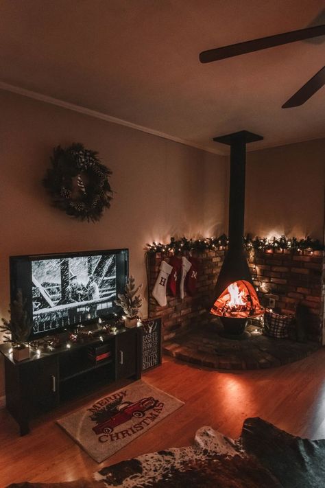 Christmas home decor- potbelly stove. Red and White Christmas Tree Decor + Christmas Themed Gifts Living Room Ideas Christmas, Room Ideas Christmas, White Christmas Tree Decor, Christmas Living Room Ideas, Stove Decor, Wood Burning Stoves Living Room, Christmas Living Room Decor Ideas, Red And White Christmas Tree, Pot Belly Stove