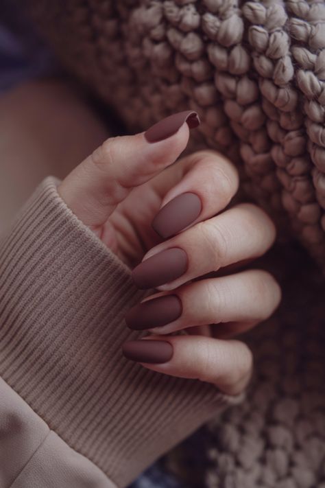 These soft matte brown nails are the ultimate fall fashion statement. The warm, earthy tones complement your cozy autumn wardrobe, making this trendy nail design a must-have for the season. Perfect for those who love simple yet chic fall nail ideas, this look is both fashionable and versatile. Embrace the autumn vibes with these stylish brown nails! Brown Nail White Tip, Muted Brown Nails, Brown Coffee Nails, Warm Tone Nails Design, Nails For Soft Autumn, Simple Fall Nails Coffin Shape, Thanksgiving Nails Matte, Natural Brown Nails, Autumn Matte Nails