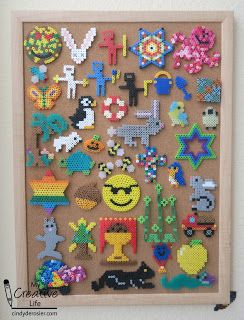 displayed on cork board Perler Bead Display Ideas, Display Perler Bead Creations, How To Display Perler Bead Art, Perler Bead Display, Perler Bead Teacher Gift, Bead Mania Ideas, Bead Display, Perler Bead Creations, Makerspace Activities