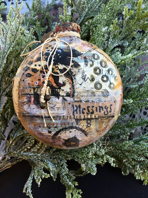 A unique and different way to take mixed media art.  Check out this collaged glass ornament using gesso, ephemera and StencilGirl® stencils. Project by Debi Adams. #stencilgirl #mixedmedia #ornament #christmasornament #layers #ephemera Mixed Media Christmas, White Sharpie, Mixed Media Diy, Christmas Mix, Canvas Art Projects, Mary Engelbreit, Collage Art Mixed Media, Wood Christmas Ornaments, Pink Paint