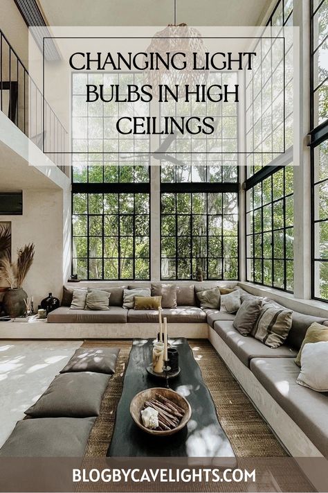 🛠️ Simplify your high ceiling house interiors lighting updates with our bulb-changing guide. Safe, easy, and quick! Tap to learn more. 🏠💡 Ceiling House Interiors, High Ceiling House Interiors, High Ceiling House, How To Clean Chandelier, High Ceiling Kitchen, High Ceiling Decorating, Lighting Updates, High Ceiling Lighting, Metal Wall Light