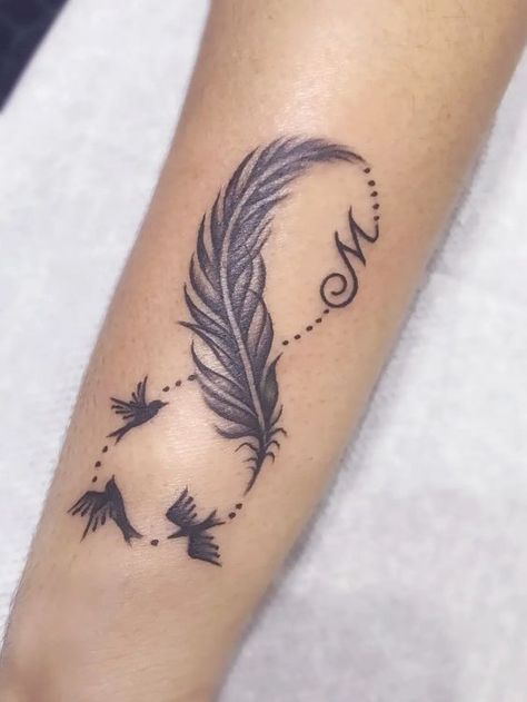 Give a gift to a loved one. Choose one of 50+ unique paired infinity tattoo ideas with names, dates, and symbols that will emphasize the power of your love. Name Infinity Tattoo, Tattoo Ideas With Names, Mission Tattoo, Infinity Tattoo Ideas, Infinity Name Tattoo, Pixel Tattoo, Infinity Tattoo With Feather, Infinity Couple Tattoos, 2023 Tattoo