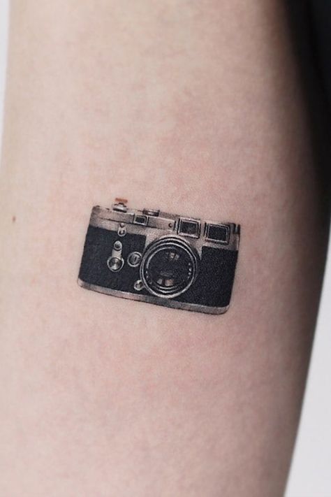 Photography Inspired Tattoos, Videographer Tattoo, Photographer Tattoos, Music And Photography Tattoos, Small Camera Tattoo, Camera Mini Tattoo, Camera Small Tattoo, Film Photography Tattoo, 35mm Film Tattoo