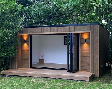 Tucked away amongst the trees, @green.space.studios have created this cosy garden room using Cladco Composite Woodgrain Cladding in Teak for a traditional look.  Our Composite Wall Cladding Boards are a perfect choice for garden room cladding, due to their low maintenance, easy installation and authentic timber appearance.   Our Composite Boards are available in eight colours with matching Corner Trims in Teak, as pictured. Composite Garden Room, Garden Room Cladding, Garden Room Design, Plastic Cladding, Cosy Garden, Fibre Cement Cladding, Cladding Ideas, Pvc Decking, Composite Cladding