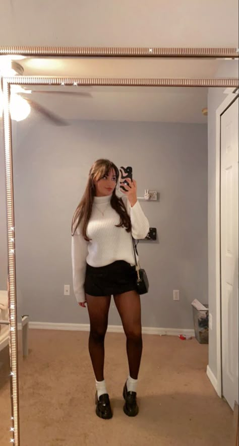 Shoes That Go With Mini Skirts, Black Skirt Outfit Winter Tights, Mini Dress With Sweater Over It, Sweater Skirt And Tights Outfit, How To Style Mini Skirts With Tights, Black Mini Skirt Outfit Sweater, White Leather Skirt Outfit Fall, Sweater Dress Loafers, Chunky Sweater And Mini Skirt Outfit