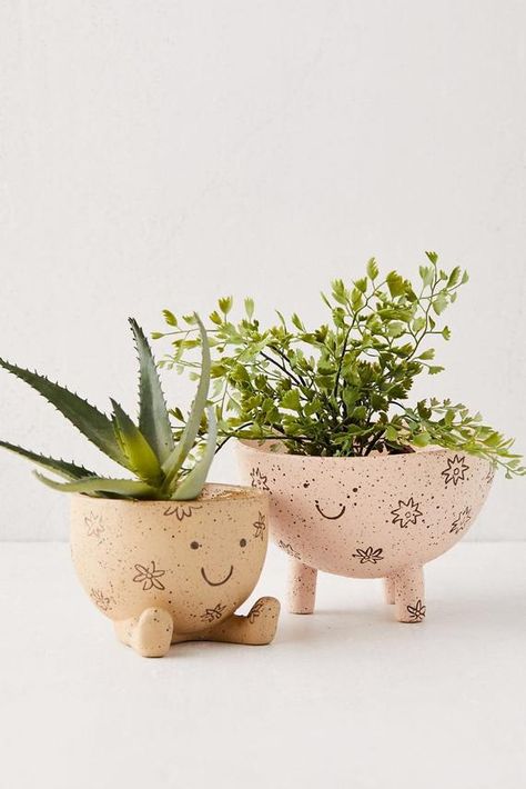 Three-Legged Planter Give your plants a buddy with this cute little planter. Ceramic bowl basin sits on a trio of legs for an elevated effect. Content + Care - Ceramic - Wipe clean - Imported Size - Dimensions: 5.9”l x 5.63”w x 3.75”h - Weight: 0.94 lbs Clay Plant Pots, Boho Dorm, Tanah Liat, Have Inspiration, Ceramics Ideas Pottery, House Plants Indoor, Diy Clay Crafts, Plant Pots, Ceramic Planters