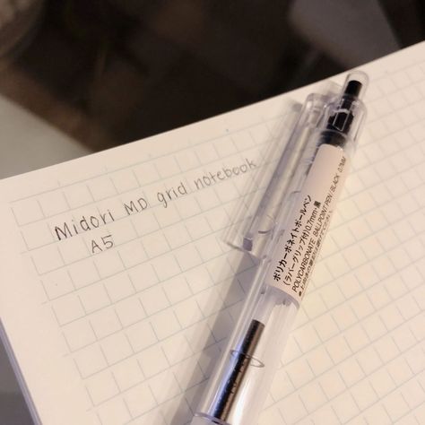 Midori MD grid notebook in a5 with writings on - notes Muji Pens, Stationery Brands, Midori Notebook, Quill Pen, Tassel Bookmark, Grid Notebook, Japanese Stationery, Leather Notebook, Fountain Pen Ink