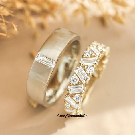 Eternity Couple Band Ring, Baguette & Round Cluster Moissanite Diamond Eternity Band, His And Her Promise Ring For Couple, Couple Rings ✹✹𝐖𝐞𝐥𝐜𝐨𝐦𝐞 𝐭𝐨 𝐂𝐫𝐚𝐳𝐲𝐃𝐢𝐚𝐦𝐨𝐧𝐝𝐬𝐂𝐨✹✹ ⇨ 1st His Ring:-> ✎ Band Wide: 5 mm Detail about stones Moissanite & Simulated Stone: ----------------------------- Stone Shape: Baguette Cut Stone Size: 5X2.50 mm Color: Colorless Cut: Excellent Clarity: VVS ⇨ 2nd Her Ring:-> Detail about stones Moissanite & Simulated Stone: ----------------------------- Stone Shape: Baguette & Round Cut Stone Size: 4X2 mm & 2 mm Weight: 4.00 TCW Color: Colorless Cut: Excellent Clarity: VVS ★ 𝑰𝒕𝒆𝒎 𝑫𝒆𝒕𝒂𝒊𝒍𝒔:- ☛ Metal Purity: Solid Gold (10KT, 14KT, 18KT); Silver(925 Sterling, 935 Argentium), 950 Platinum ☛ Metal Tone: Yellow, White, Rose ☛ Stamp/Hallmark: Yes His And Her Matching Wedding Bands, His Hers Wedding Bands, Elegant Couple Rings With Thick Band, Platinum Couple Rings, His And Her Wedding Bands, His And Her Rings, Eternity Band With Baguette Cut Diamonds For Promise Ring, Matching Wedding Bands His And Hers, Gold Baguette Cut Eternity Band As Promise Ring