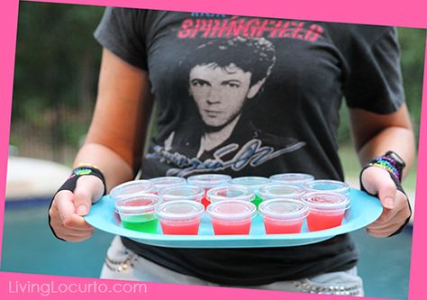 Totally Awesome 80's Neon Birthday Party Ideas and jello shots recipe. LivingLocurto.com #drinks 80s Party Drinks, 80s Drinks Alcohol, 90s Theme Jello Shots, 80s Alcoholic Drinks, 80s Themed Drinks, Neon Birthday Party Ideas, Lime Jello Shots, Shots Recipes, Jello Shots Recipe