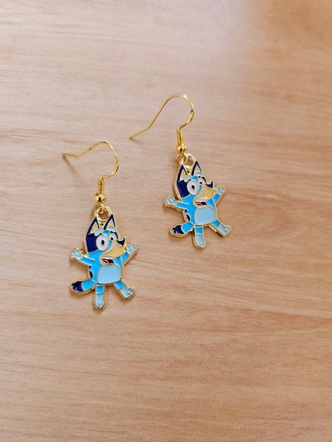 Bluey Earrings! Because everyone loves Bluey! Bluey And Bingo Bracelets, Bluey Bingo Earrings, Socks Heeler Bluey, Bluey Socks Heeler, Bluey Bingo Hair Bow, Crazy Earrings, Sunflower Earrings, Snowflake Earrings, Christmas Snowflakes