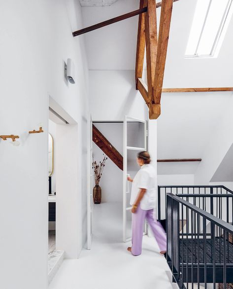 Monastery Chapel Turned Open-Plan Apartment in Dutch Village | VISI Monastery Aesthetic, Monastery Interior, Dutch Village, Open Plan Apartment, Plan Apartment, Prague Old Town, Pearl Chandelier, Interior Color Schemes, Pink Sofa