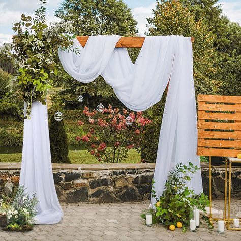 PRICES MAY VARY. Chiffon Wedding Arch Drapes: Includes 1 panels white chiffon wedding drapery, each panel wedding drapery is the size of 27.5 inches wide by 6 yards(19ft) long. White Sheer Backdrop Curtains: Sheer arch drapes fabric is made of Soft and Translucent fabric, silky smooth, wrinkle free, soft to the touch. Good vertical feel and durability, easy to clean,used durable and reusable. Widely Used: Wedding Arch Draping Fabric has a variety of uses, they can be used as curtains, can also b Reception Ceiling, Wedding Drapery, White Wedding Arch, Wedding Stage Backdrop, Fabric Draping, Ceremony Arch, Wedding Fabric, Wedding Stage, Backdrop Decorations