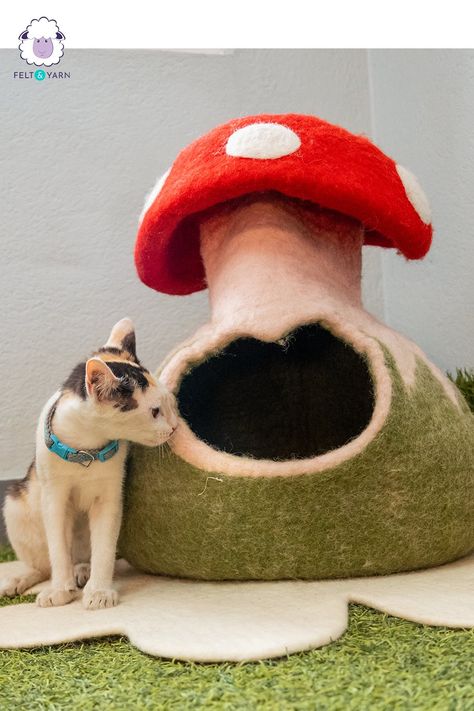 Going to a realm of cartoony vibe, we have this unique premium cat cave resembling beautiful shades of a mushroom. These cat caves are beautifully made and besides their tall structure, they can independently stand up without any problems. This cat cave not only serves its purpose of being the best cat house but is also great as a decor piece to add colors to your room. Wool felt mushroom cat cave | dog bed | cat house decor ideas Mushroom Cat Bed, Diy Pet Toys Cats, Mushroom Ideas, Cat Mushroom, Cave Dog Bed, House Decor Ideas, Dog House Bed, Diy Pet Toys, Felt Mushroom