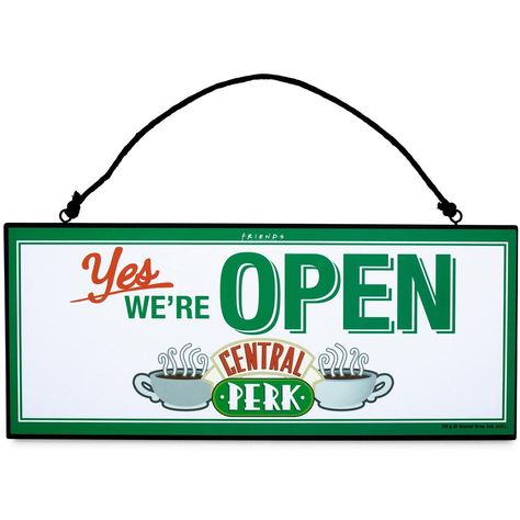 Here's a really clever way to let your friends know they're welcome to enter or not your room or office. Hang this terrific Friends Central Perk Reversible Hanging Sign on your door! Measuring about 12-inches wide x 5-inches tall, one side says "Yes, We're Open." The other side states "Sorry, We're Closed." How cool is that?! Officially licensed. Produced by Silver Buffalo, a trendsetting housewares and home decor company based in the heart of New York City. Central Perk Sign, Monica Rachel, Wall Decor For Kitchen, Friends Merchandise, Hangout Spot, Decor 2023, Door Plaque, Decor For Kitchen, Friends Central Perk