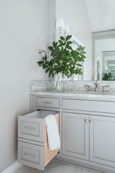 The homeowners requested a built-in hamper designed to seamlessly blend into the vanity cabinets, so no one is the wiser. Built In Vanity In Bathroom, Built In Bathroom Vanity, Bathroom Hampers, Vanity In Bathroom, 42 Inch Bathroom Vanity, Bathroom Vanity Ideas, Built In Vanity, Outdoor Bathroom, Bathroom Necessities