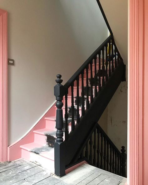 Hallway and landing with pink stairs and black bannisters, using Mylands paint - Blackout on bannisters, Belgravia - white with a hint of grey - on walls and Pink House on the stairs Pink Stairwell, Blush Pink Staircase, Pink Bannister, Pink Stair Banister, Christmas Decor Boxes, Pink Stairs, Stair Mats Pink, Mylands Paint, Pink Hallway