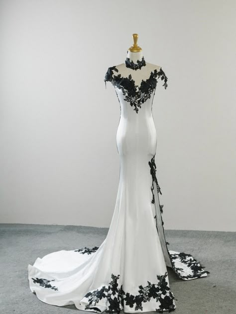 Demon Wedding Dress, White Wedding Dresses With Black Lace, Mom Traditional Wedding Dress, White Wedding Dress With Black Lace Overlay, Black And White Wedding Dress Mermaid, Batman Wedding Dress, White And Black Prom Dress, White Wedding Dress With Black Accents, Wedding Dresses With Black Lace