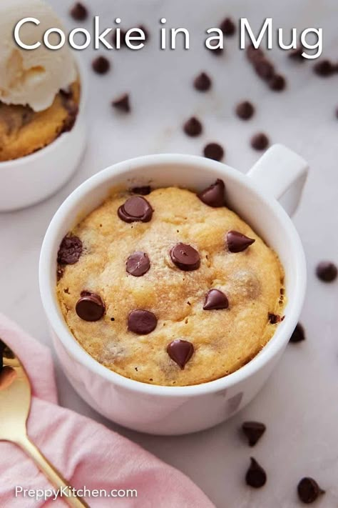 All you need are a handful of pantry staples to make this warm, gooey Cookie in a Mug recipe. It takes seconds to put together and a minute in the microwave, and you’ll satisfy your cookie craving in no time. You don’t even have to turn on the oven. Cookie In A Mug Recipe, Cookie Baked Oats, 1 Minute Mug Cakes, Mug Cookie Recipes, Mug Recipe, Mug Cake Recipes, Cookie In A Mug, Homemade Vanilla Extract, Gooey Cookies