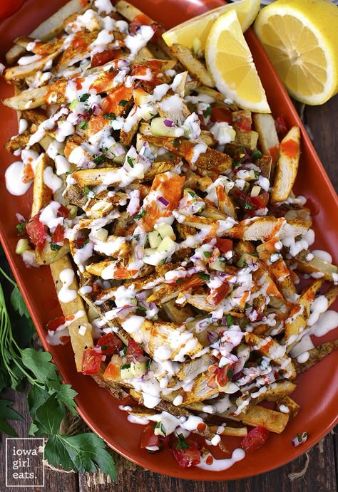 Chicken Shawarma Fries with Mediterranean Salsa and Garlic Sauce are a party on a platter! Full of delicious, fresh and bold flavors. | iowagirleats.com #glutenfree Loaded French Fries Recipe, Mediterranean Salsa, Chicken Houses, Shawarma Recipe, French Fries Recipe, Loaded Fries, Iowa Girl Eats, Healthy Vegan Snacks, Fries Recipe