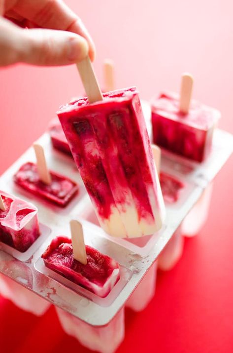 This healthy Chocolate Covered Cherry Yogurt Popsicles recipe are an easy-to-make, healthy, and tasty treat to make this summer. With just frozen yogurt, fruit, and magic shell chocolate drizzle, they're full of sugar-free, family-friendly flavor. Cherry Yogurt Popsicles, Cherry Yogurt, Popsicles Recipes, Homemade Fruit Popsicles, Cherry Popsicles, Healthy Popsicle Recipes, Chocolate Covered Cherry, Ice Pop Recipes, Crazy Laura