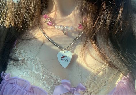 hello kitty guitar pick necklace Hello Kitty Guitar Strap, Pick Necklace Guitar, Guitar Pick Necklace Aesthetic, Hello Kitty Guitar, Pick Necklace, Guitar Pick Necklace, Guitar Picks, Dream Body, Guitar Strap