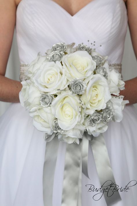 This stunning brides bouquet is round bouquet with ivory and silver roses accented with silver pearls. This bouquet is approx 9 inches wide Bride Bouquets White, Davids Bridal Gowns, Gold Wedding Flowers, Red Bouquet Wedding, Budget Bride, Florist Wedding, Beautiful Wedding Flowers, Brides Bouquet, White Bride