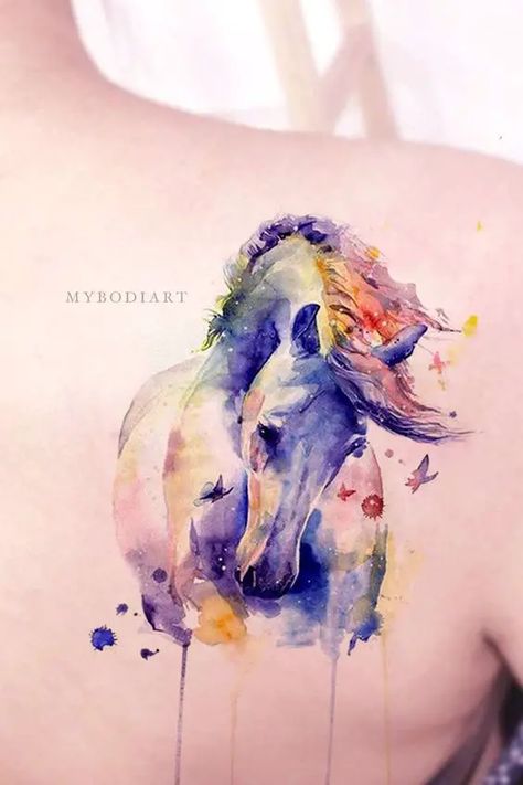 15 Spectacular Horse Tattoos and Their Symbolic Meanings - The Paws Horse Tattoo Ideas, Tattoo Ideas For Female, W Tattoo, Tattoo Horse, Horse Tattoo Design, Tattoo Sheet, Tattoo Watercolor, Unicorn Tattoos, Type Tattoo