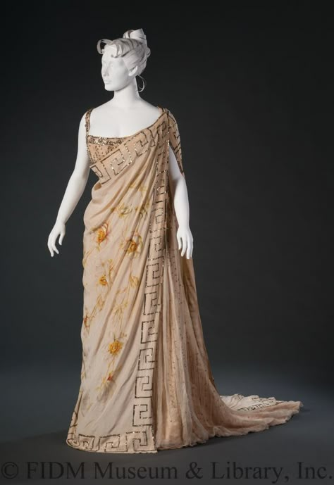 Evening Ensemble: ca. 1890's, French or English Couture house, Greco-Roman himation, hand-painted silk crepe embellished with hand-blown mercury-lined glass beads, chiffon undergown. Ancient Greek Clothing, Greek Dress, 1890s Fashion, Historical Dress, Historic Fashion, 19th Century Fashion, Roman Fashion, Greek Clothing, Retro Mode