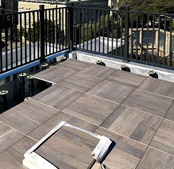 Roof Deck Tiles Ideas - Pros And Cons Of Tile Rooftops, Installing Tips, Best Tile For Rooftop Deck Rooftop Tiles Idea, Rooftop Tiles Design, Tiles For Rooftop, Rooftop Deck Flooring, Rooftop Flooring Ideas, Terrace Flooring Ideas Tile, Deck Tiles Ideas, Roof Tiles Ideas, Roof Pics