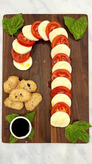 Maegan Brown ~ The BakerMama on Instagram: "❤️🤍 Candy Cane Caprese Board ❤️🤍 a simple and stunning way to serve an appetizer during the holidays! 🎄🍅🧀 It only requires a few ingredients and comes together in a matter of minutes so you can spend more time with your loved ones this holiday season. Comment “recipe” and I’ll DM you the link! or tap the link in profile @thebakermama for all the board building details. Follow for more festive recipes and ENJOY! ❤️ #TheBakerMama #BoardsByTheBakerMama https://thebakermama.com/recipes/caprese-candy-cane-board/ #caprese #candycanecaprese #candycane #christmasappetizer #holidayappetizer #cheeseboard #cheeseplatter #christmascaprese #christmas #christmasfood #christmasrecipe #christmasideas #merrychristmas #candycane #christmassnacks" Christmas Caprese, Caprese Board, Acorn Squash Recipes Healthy, Bagel Crisps, Bagel Dip, Ensalada Caprese, Smoked Salmon Bagel, Salmon Bagel, Building Details