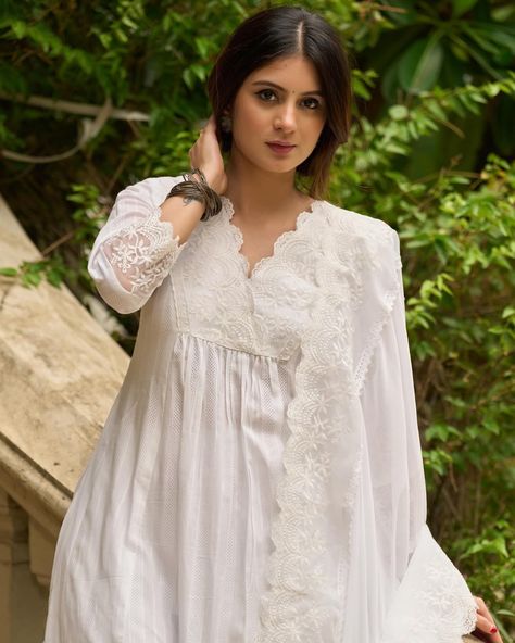 Elevate your wardrobe with our elegant White Self-Textured Lace Yoke Kurta set. Designed to perfection, this kurta comes with matching pants and an optional dupatta. The intricate self-textured lace yoke adds a touch of sophistication to your look. Perfect for any occasion, this set is a must-have for the fashion-forward woman. #sujatra #sujatraglobal #sujatrakurta #cottonkurta #cottonpants #lacekurtas #laceyoke #whitekurtaset #newarrivals White Churidar, Kurti Dupatta, Churidar Designs, Kurta Style, White Kurta, Kurta Designs Women, Matching Pants, Kurta Designs, Churidar