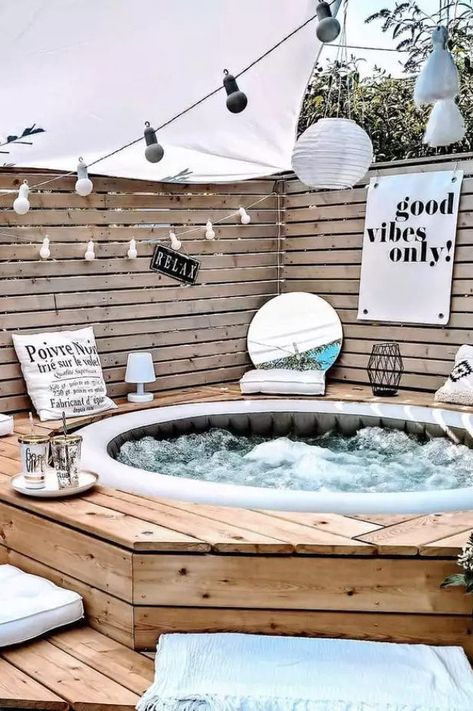 This gorgeous DIY spa corner looks like an absolute dream. It features a surrounding deck and an inflatable whirlpool hot tub. Makeover your small backyard this summer with one of these backyard oasis ideas. #BackyardDecorating #SmallBackyardIdeas #BackyardOasisIdeas #TheSpruce Deco Spa, Deck Piscina, Outdoor Hot Tub, Jade Design, Hot Tub Backyard, Tank Pool, Stock Tank Pool, Pools Backyard, Gardens Design