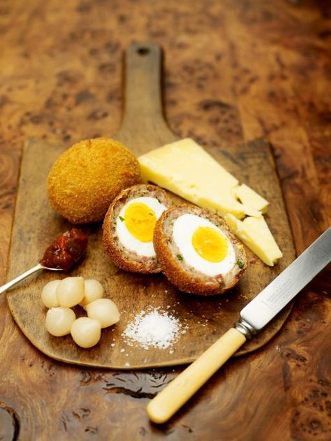 proper scotch eggs with lovely scottish cheese & pickle | Jamie Oliver | Food | Jamie Oliver (UK) Scotch Eggs Recipe, Scottish Recipes, Scotch Eggs, Jamie Oliver Recipes, English Food, British Food, Picnic Foods, Crescent Rolls, Jamie Oliver