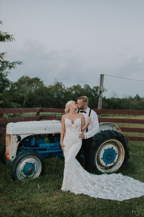 Our couples love the old Ford tractor!  Barn wedding in Northeast OH.  photo compliments of Campbell Media Wedding Tractor Pictures, Wedding Photos With Tractor, Tractor Wedding Photos, Farm Wedding Photo Ideas, Rustic Wedding Photo Ideas, Wedding Tractor, Tractor Wedding, Farmer Wedding, Barnyard Wedding