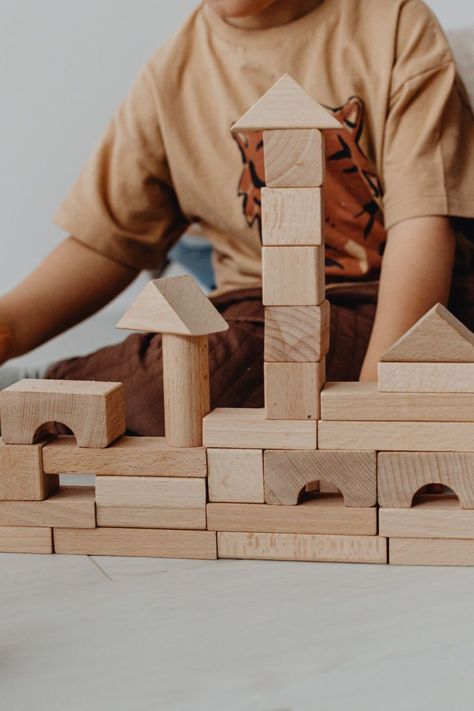 Inspiring classic creativity and improving dexterity, this classic wooden block set and carry case includes 13 different shapes for your children to build to their heart's content. Their imagination will run wild creating unique masterpieces with the variety of shapes. #montessoriblocks #woodentoysforkids #woodentoysfortoddlers #giftideasforkids #woodentoys Wood Stacking, Wooden Building, Wooden Building Blocks, Steam Education, Wooden Buildings, Open Ended Toys, Stacking Blocks, Product Shoot, Woodworking Ideas Table