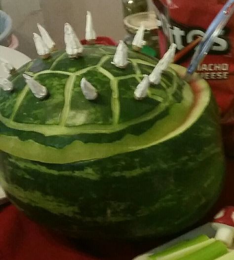 Bowser shell filled with (Lava fruit salad) melon balls. Using paring knife and painted cut down baby carrots attached with tooth picks. Super Mario Watermelon, Mario Watermelon, Mario Brothers Decorations, Bowser Birthday Party, 1 Birthday Theme, Bowser Shell, Super Mario Birthday Ideas, Bowser Birthday, Mario Bday Party