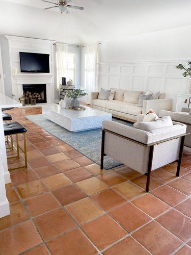 Living Room Decor Tile Floor, Saltillo Floor Living Room, Living Rooms With Tile Floors, Tile Floor Throughout House, Tile Floor Decor Living Room, Spanish Tiles Living Room, Spanish Tile Bedroom, Decorating With Saltillo Tile Floors, Spanish Tile Living Room