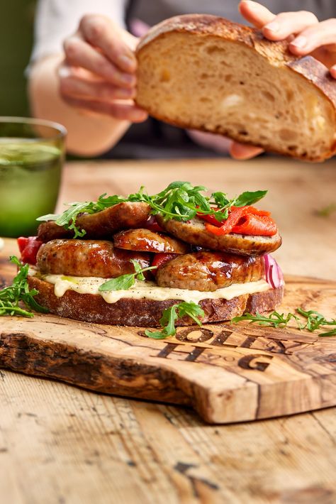 Try this lunch sandwich idea with our award winning British sausages. We love trying new sausage sandwich ideas and this combination of tomato relish, a hash brown, rocket, aioli and our peppery British sausages is a right treat. Give this a go if you want to try new lunch sandwich recipes or have a sausage sandwich recipe go to! Sausage and peppers are a dreamy combo!  #sausagesandwich #sausagerecipe #sausagerecipes #britishsausages #sandwich #sandwichrecipe #lunch #aioli #sourdough Sausage Burgers Recipes, Sausage Sandwich Ideas, Sandwich Recipes Lunch, Lunch Sandwich Ideas, Quick Sandwich Recipes, Bacon Sandwich Recipes, Sausage Sandwich Recipes, Lunch Sandwich Recipes, Sausage Burgers