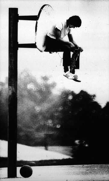 Photographer/Creator  Jim Messina  Collection  1973  Publisher  Bloomington Courier Tribune  Caption/Description  Man sits on top of the basketball hoop. Sitting On Basketball Hoop, Buffalo Springfield, Person Sitting, Basketball Hoop, Messina, Photoshoot Inspiration, Buffalo, Basketball, Portfolio