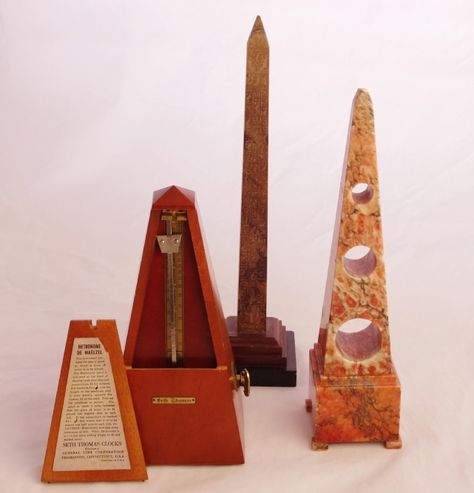 A trio of beautiful and useful objects includes a Seth Thomas metronome, an Italian alabaster sculpture, and a museum reproduction obelisk - Dim: 3.0" W x 11.75" H x 3.0" D. Alabaster Sculpture, Useful Objects, Seth Thomas, Grand Tour, Bookends, Sculpture