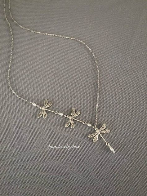 This Lariat & Y Necklaces item by jmesjewelrybox has 1757 favorites from Etsy shoppers. Ships from United States. Listed on 17 Aug, 2024 Insect Necklace, Silver Dragonfly Necklace, Trio Necklace, Indie Jewelry, Dragonfly Necklace, Dope Jewelry, Funky Jewelry, Jewelry Lookbook, Jewelry Inspo